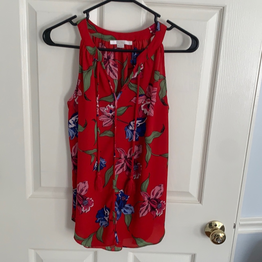 Red floral sleeveless blouse